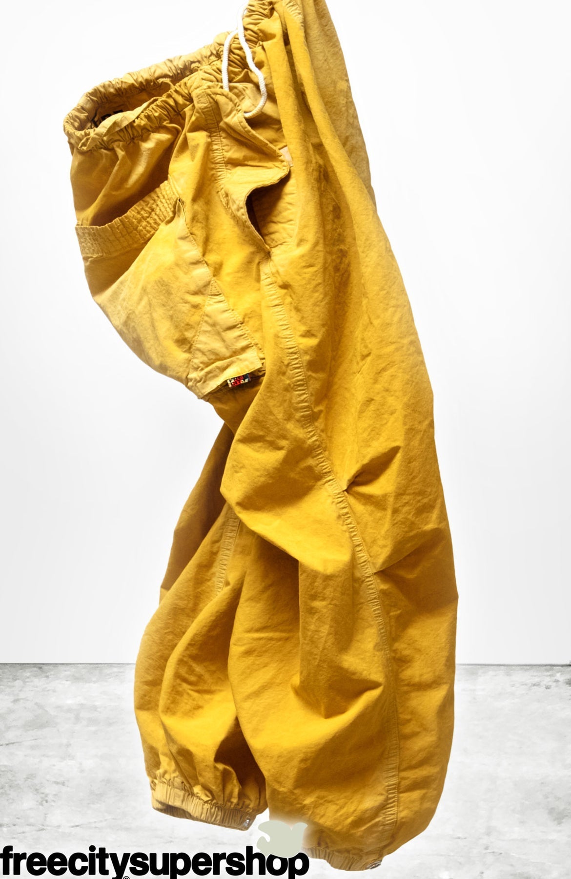 CANYONKID OUTOFSIGHT POPLIN JUMP PANT IN YELLOWPLANT POWDER